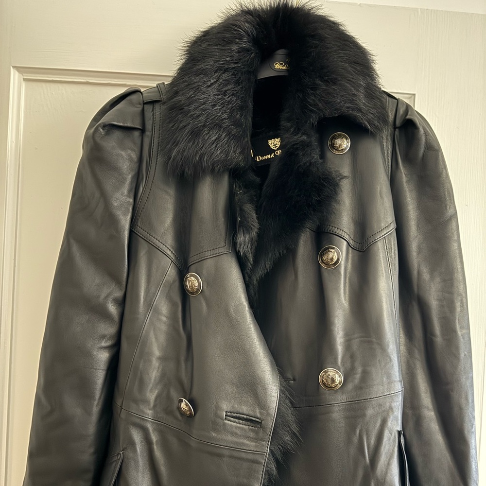 Never worn Diane Gilman Black real Leather Jacket with Fur